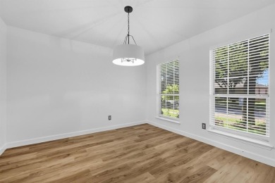 Beautifully updated and move-in ready, this 4-bedroom, 3.5-bath on Stewart Peninsula Golf Course in Texas - for sale on GolfHomes.com, golf home, golf lot