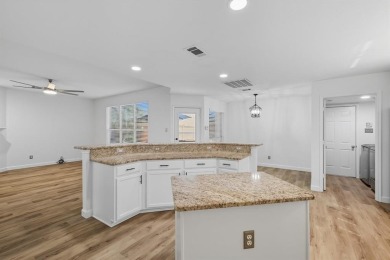 Beautifully updated and move-in ready, this 4-bedroom, 3.5-bath on Stewart Peninsula Golf Course in Texas - for sale on GolfHomes.com, golf home, golf lot
