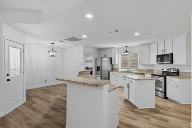Beautifully updated and move-in ready, this 4-bedroom, 3.5-bath on Stewart Peninsula Golf Course in Texas - for sale on GolfHomes.com, golf home, golf lot