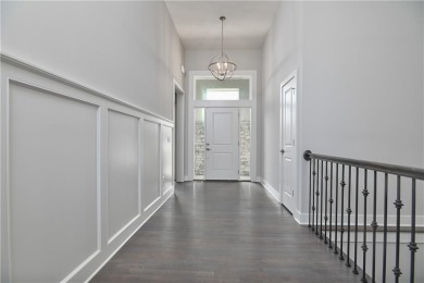 This BEAUTIFUL HOME backs to and walks out to a fully treed on Falcon Lakes Golf Course in Kansas - for sale on GolfHomes.com, golf home, golf lot