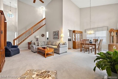 Welcome home to this charming detached colonial-style condo in on The Maples Club in Michigan - for sale on GolfHomes.com, golf home, golf lot