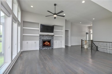 This BEAUTIFUL HOME backs to and walks out to a fully treed on Falcon Lakes Golf Course in Kansas - for sale on GolfHomes.com, golf home, golf lot