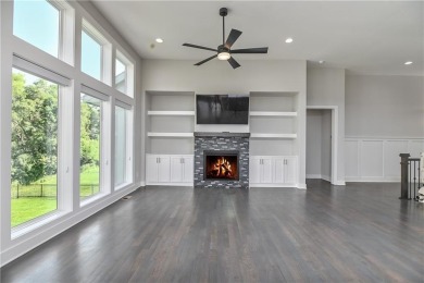 This BEAUTIFUL HOME backs to and walks out to a fully treed on Falcon Lakes Golf Course in Kansas - for sale on GolfHomes.com, golf home, golf lot