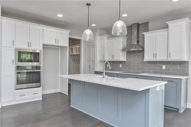 This BEAUTIFUL HOME backs to and walks out to a fully treed on Falcon Lakes Golf Course in Kansas - for sale on GolfHomes.com, golf home, golf lot