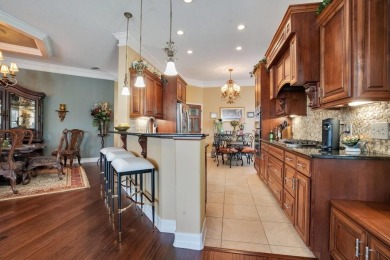Experience refined living in this exquisitely remodeled on Grasslands Golf and Country Club in Florida - for sale on GolfHomes.com, golf home, golf lot