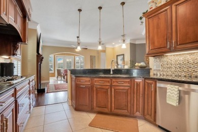 Experience refined living in this exquisitely remodeled on Grasslands Golf and Country Club in Florida - for sale on GolfHomes.com, golf home, golf lot