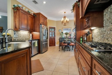 Experience refined living in this exquisitely remodeled on Grasslands Golf and Country Club in Florida - for sale on GolfHomes.com, golf home, golf lot