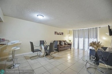 Experience this beautiful and huge 1 bed/ 1 bath *SECOND-FLOOR* on Country Club of Miami in Florida - for sale on GolfHomes.com, golf home, golf lot