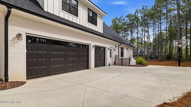 Welcome to 2 Masters Ridge -- where timeless design meets modern on Mid South Club in North Carolina - for sale on GolfHomes.com, golf home, golf lot