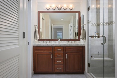 Discover refined island living with this beautifully updated top on Mauna Lani Resort Golf Course in Hawaii - for sale on GolfHomes.com, golf home, golf lot