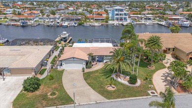 Welcome to your piece of coastal paradise at 5340 Pilots Place on Gulf Harbors Golf Course in Florida - for sale on GolfHomes.com, golf home, golf lot