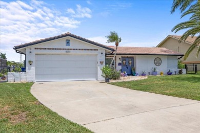 Welcome to your piece of coastal paradise at 5340 Pilots Place on Gulf Harbors Golf Course in Florida - for sale on GolfHomes.com, golf home, golf lot