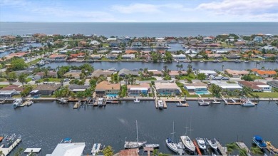 Welcome to your piece of coastal paradise at 5340 Pilots Place on Gulf Harbors Golf Course in Florida - for sale on GolfHomes.com, golf home, golf lot