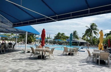 A must see!! Completely Remodeled, Modern and Full of Natural on Hillsboro Pines Golf in Florida - for sale on GolfHomes.com, golf home, golf lot