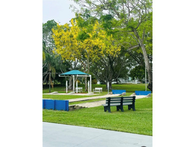 A must see!! Completely Remodeled, Modern and Full of Natural on Hillsboro Pines Golf in Florida - for sale on GolfHomes.com, golf home, golf lot