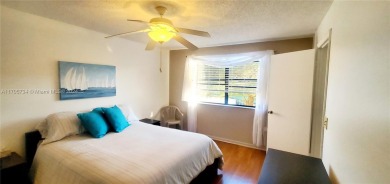 BEAUTIFUL TURN KEY 2nd floor CONDO in a 55+ active community on Sunrise Lakes Phase IV Golf Course in Florida - for sale on GolfHomes.com, golf home, golf lot