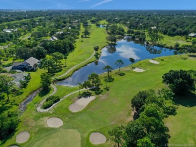 Nestled on a private acre w/majestic golf course views, this on Evergreen Club in Florida - for sale on GolfHomes.com, golf home, golf lot