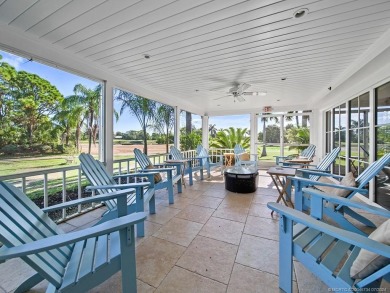 Nestled on a private acre w/majestic golf course views, this on Evergreen Club in Florida - for sale on GolfHomes.com, golf home, golf lot