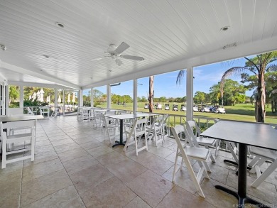 Nestled on a private acre w/majestic golf course views, this on Evergreen Club in Florida - for sale on GolfHomes.com, golf home, golf lot