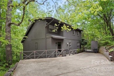 This lovely 3 bed / 2.5 bath home is conveniently located behind on Rumbling Bald Resort on Lake Lure in North Carolina - for sale on GolfHomes.com, golf home, golf lot