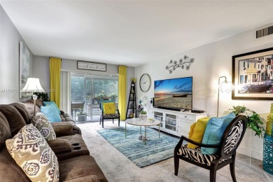 Welcome to this beautifully updated 2-bedroom, 2-bathroom condo on Wynmoor Golf Course in Florida - for sale on GolfHomes.com, golf home, golf lot