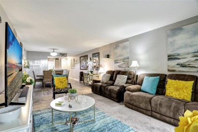 Welcome to this beautifully updated 2-bedroom, 2-bathroom condo on Wynmoor Golf Course in Florida - for sale on GolfHomes.com, golf home, golf lot