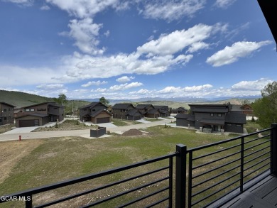 Absolutely stunning ski-in ski-out show home in Granby Ranch on Headwaters Golf Course At Granby Ranch in Colorado - for sale on GolfHomes.com, golf home, golf lot