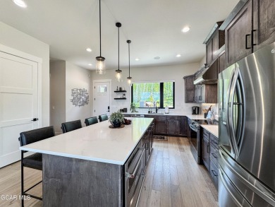 Absolutely stunning ski-in ski-out show home in Granby Ranch on Headwaters Golf Course At Granby Ranch in Colorado - for sale on GolfHomes.com, golf home, golf lot