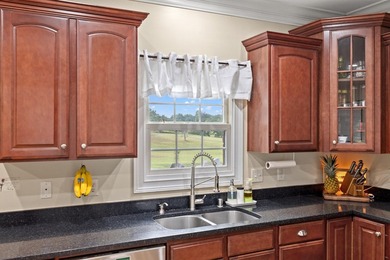 Welcome to 1084 Scenic Garden, where everyday living feels just on Wild Turkey Trace Golf Club in Kentucky - for sale on GolfHomes.com, golf home, golf lot