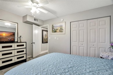 Welcome to this beautifully updated 2-bedroom, 2-bathroom condo on Wynmoor Golf Course in Florida - for sale on GolfHomes.com, golf home, golf lot