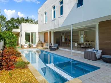 Built by Barcellona Homes in 2022, this two-story contemporary on Lake Nona Golf Club, Inc. in Florida - for sale on GolfHomes.com, golf home, golf lot