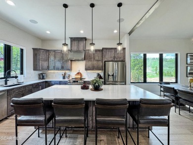 Absolutely stunning ski-in ski-out show home in Granby Ranch on Headwaters Golf Course At Granby Ranch in Colorado - for sale on GolfHomes.com, golf home, golf lot