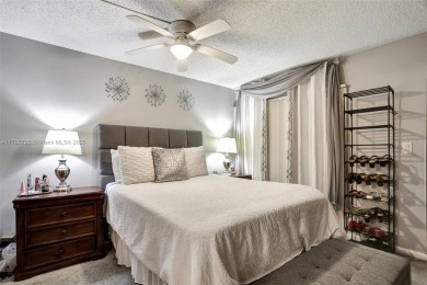 Welcome to this beautifully updated 2-bedroom, 2-bathroom condo on Wynmoor Golf Course in Florida - for sale on GolfHomes.com, golf home, golf lot