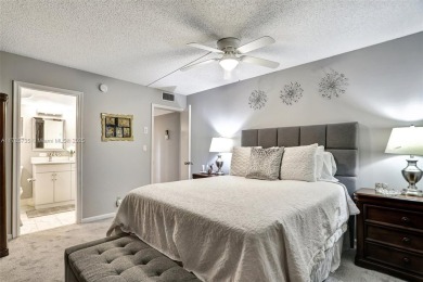 Welcome to this beautifully updated 2-bedroom, 2-bathroom condo on Wynmoor Golf Course in Florida - for sale on GolfHomes.com, golf home, golf lot