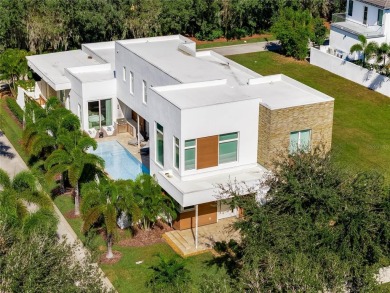 Built by Barcellona Homes in 2022, this two-story contemporary on Lake Nona Golf Club, Inc. in Florida - for sale on GolfHomes.com, golf home, golf lot