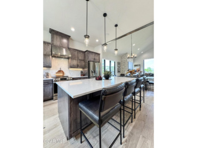 Absolutely stunning ski-in ski-out show home in Granby Ranch on Headwaters Golf Course At Granby Ranch in Colorado - for sale on GolfHomes.com, golf home, golf lot