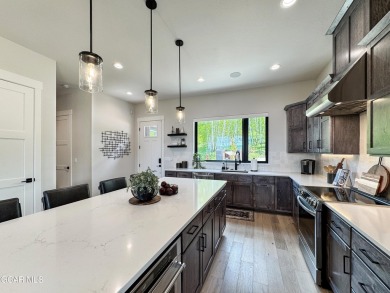 Absolutely stunning ski-in ski-out show home in Granby Ranch on Headwaters Golf Course At Granby Ranch in Colorado - for sale on GolfHomes.com, golf home, golf lot