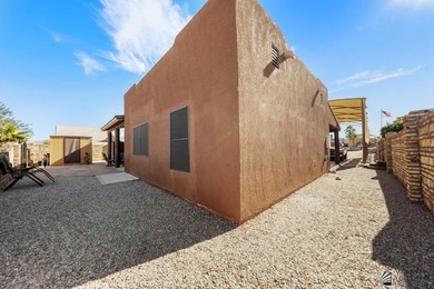 If desert living, open space, and room for your RVs and toys are on Las Barrancas Golf Course in Arizona - for sale on GolfHomes.com, golf home, golf lot