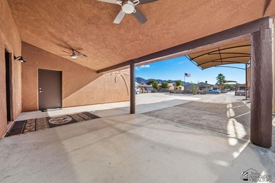 If desert living, open space, and room for your RVs and toys are on Las Barrancas Golf Course in Arizona - for sale on GolfHomes.com, golf home, golf lot