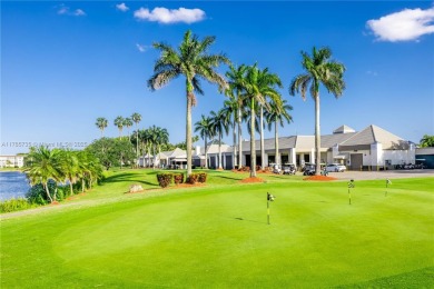 Welcome to this beautifully updated 2-bedroom, 2-bathroom condo on Wynmoor Golf Course in Florida - for sale on GolfHomes.com, golf home, golf lot