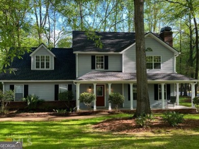 Welcome home to this spacious and well-maintained 4-bedroom, 2 on Braelinn Golf Club in Georgia - for sale on GolfHomes.com, golf home, golf lot