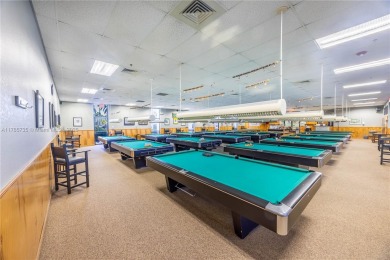 Welcome to this beautifully updated 2-bedroom, 2-bathroom condo on Wynmoor Golf Course in Florida - for sale on GolfHomes.com, golf home, golf lot