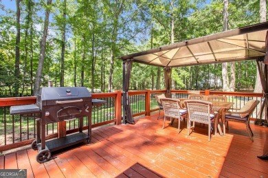 Welcome home to this spacious and well-maintained 4-bedroom, 2 on Braelinn Golf Club in Georgia - for sale on GolfHomes.com, golf home, golf lot