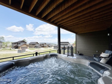 Absolutely stunning ski-in ski-out show home in Granby Ranch on Headwaters Golf Course At Granby Ranch in Colorado - for sale on GolfHomes.com, golf home, golf lot