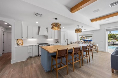 Welcome to your dream home!  This fully renovated, never lived on Key Royale Club in Florida - for sale on GolfHomes.com, golf home, golf lot