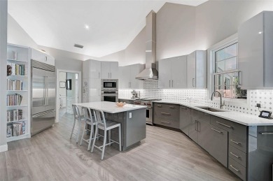 **BRILLIANTY DESIGNED, FULLY RENOVATED, STUNNING and SERENE on The Oaks Club in Florida - for sale on GolfHomes.com, golf home, golf lot