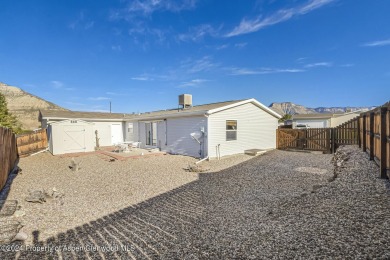 Home sweet home!! This well loved and well maintained home is on Battlement Mesa Golf Course in Colorado - for sale on GolfHomes.com, golf home, golf lot