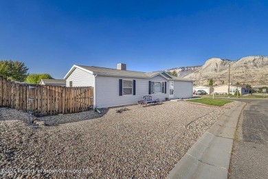 Home sweet home!! This well loved and well maintained home is on Battlement Mesa Golf Course in Colorado - for sale on GolfHomes.com, golf home, golf lot