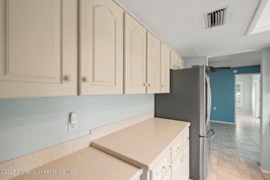 Experience resort-style living in the highly sought-after Timber on Timber Pines Golf Course in Florida - for sale on GolfHomes.com, golf home, golf lot