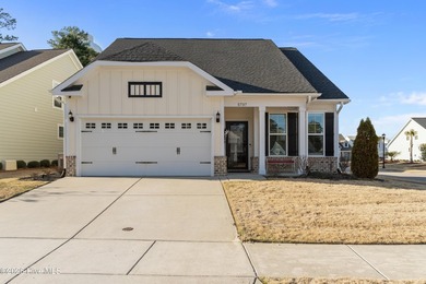 Immaculate 3-bedroom, home with bonus room on a desirable corner on Cape Fear National At Brunswick Forest in North Carolina - for sale on GolfHomes.com, golf home, golf lot